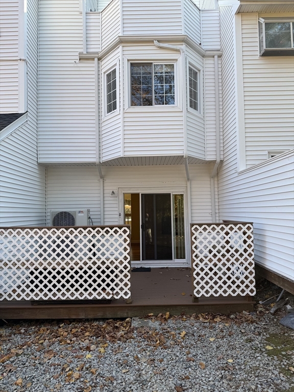191 Tall Oaks Drive, Unit C Weymouth, MA 02190 - Photo 23 of 24 a view of a wooden fence