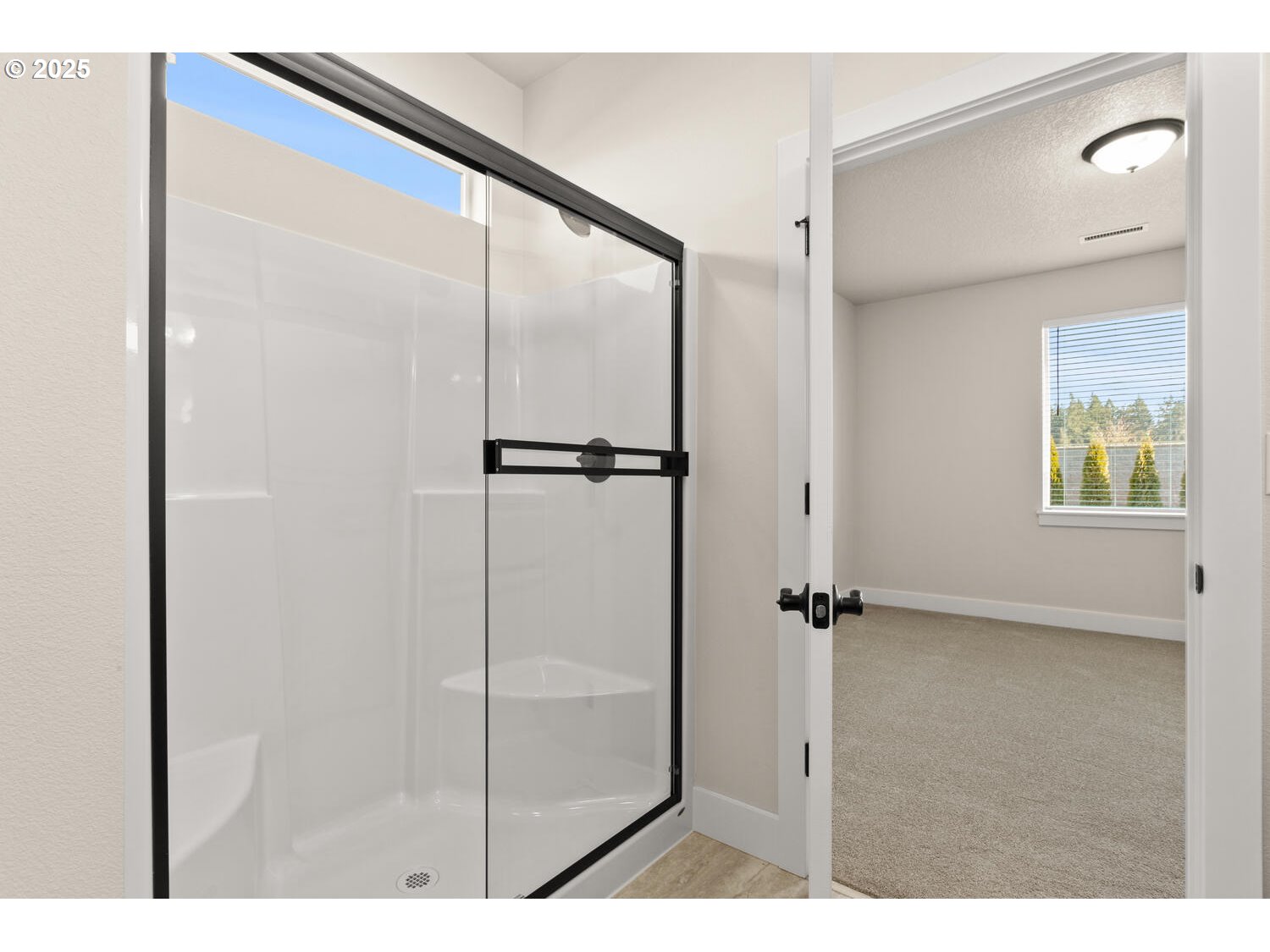 1100 North 44th Place Ridgefield, WA 98642 - Photo 16 of 29 a view of a bathroom with a glass door