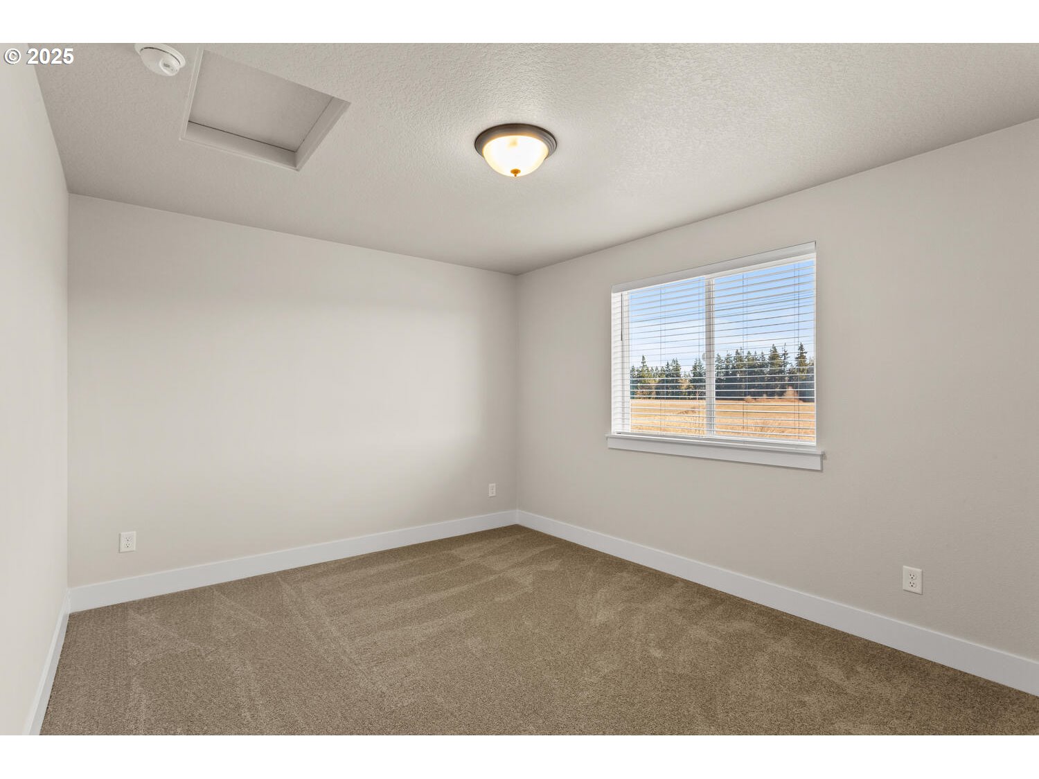 1100 North 44th Place Ridgefield, WA 98642 - Photo 20 of 29 a view of an empty room with a window