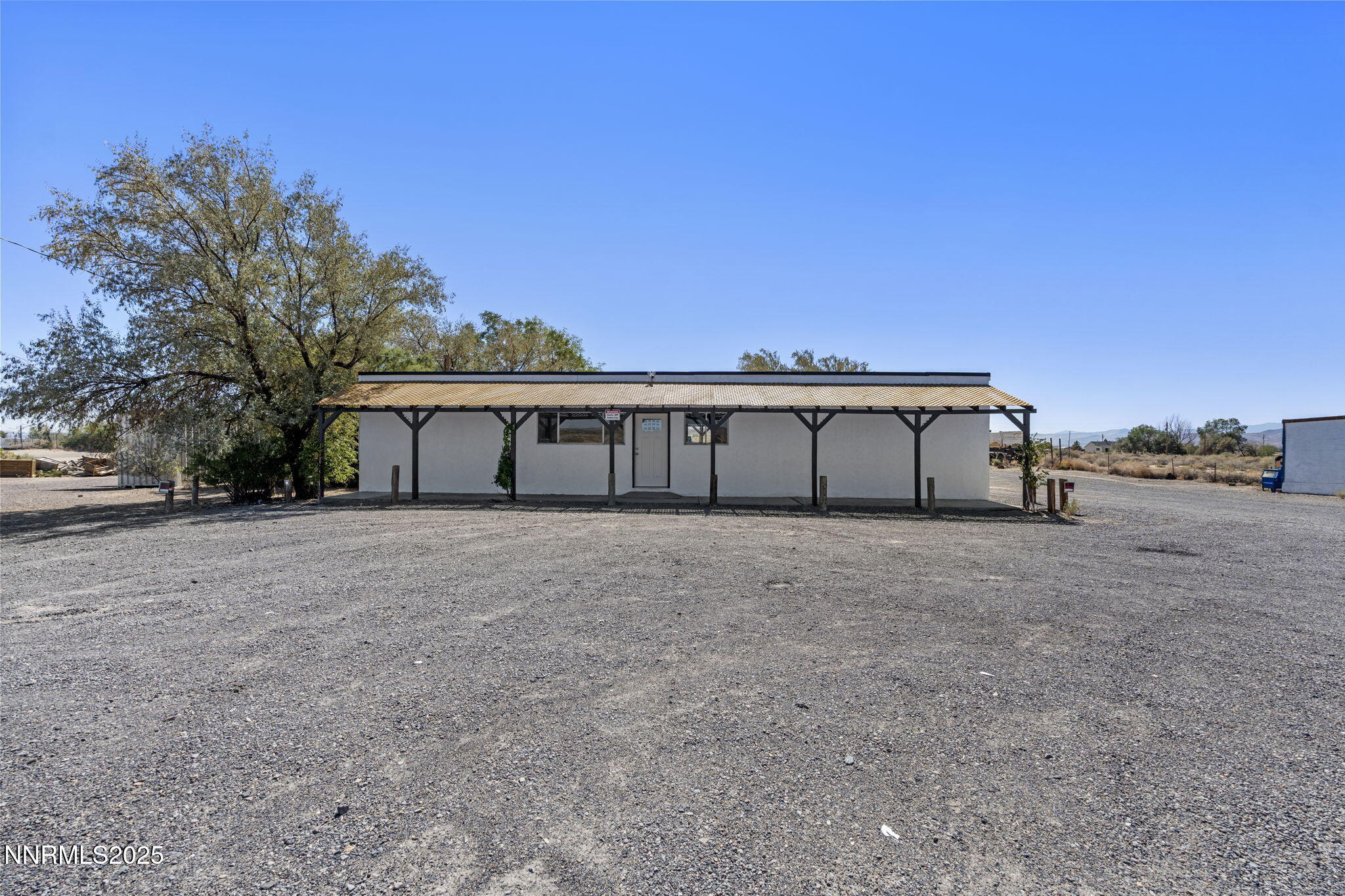 2725 East Fir Street Silver Springs, NV 89429 - Photo 1 of 56 a view of house with outdoor space and shower