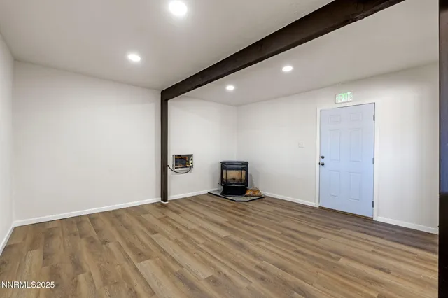a view of a livingroom with wooden floor