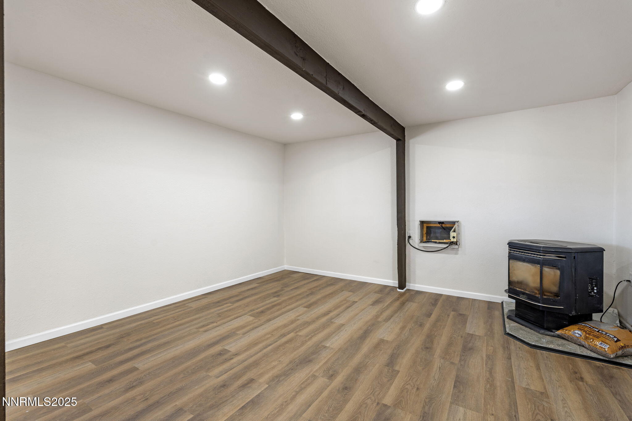 2725 East Fir Street Silver Springs, NV 89429 - Photo 17 of 56 a view of a livingroom with wooden floor
