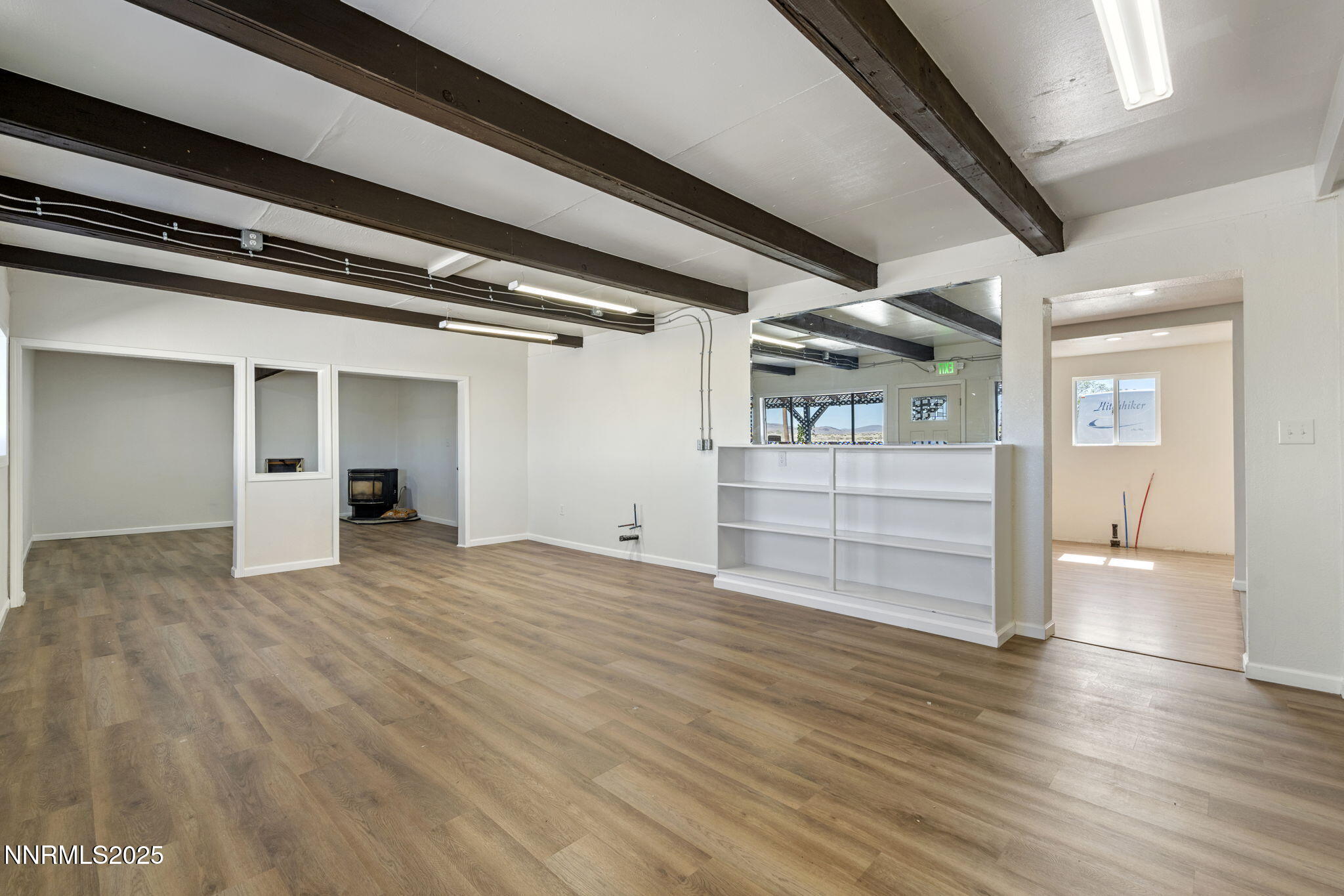 2725 East Fir Street Silver Springs, NV 89429 - Photo 19 of 56 a view of empty room with wooden floor
