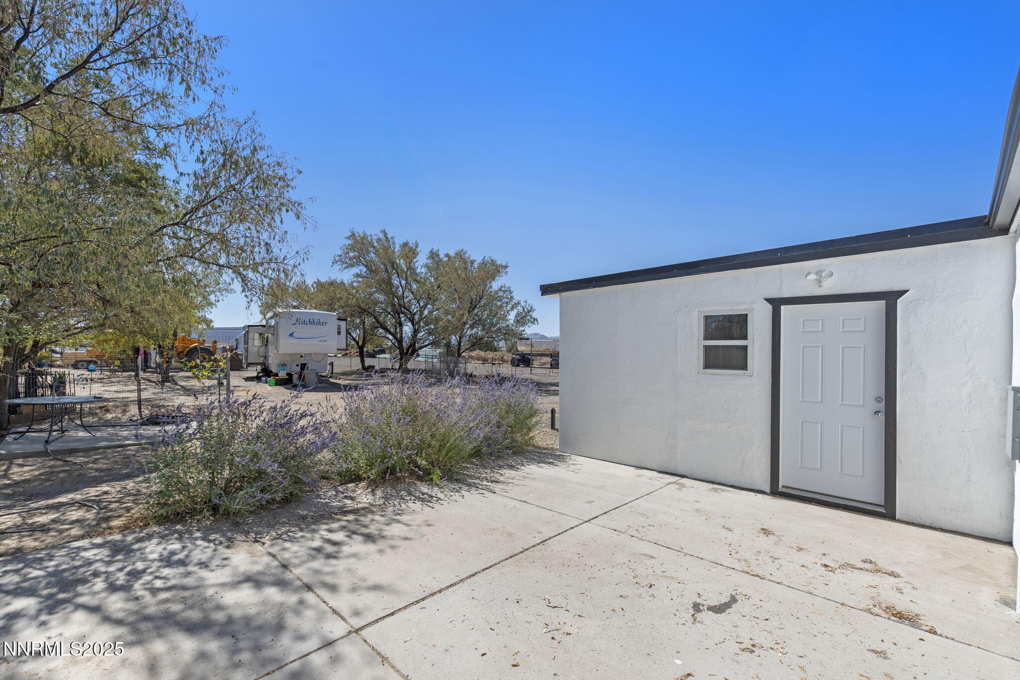 2725 East Fir Street Silver Springs, NV 89429 - Photo 34 of 56 a view of garage yard and tree