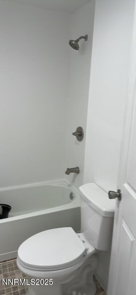 2725 East Fir Street Silver Springs, NV 89429 - Photo 53 of 56 a white toilet sitting next to a bath tub