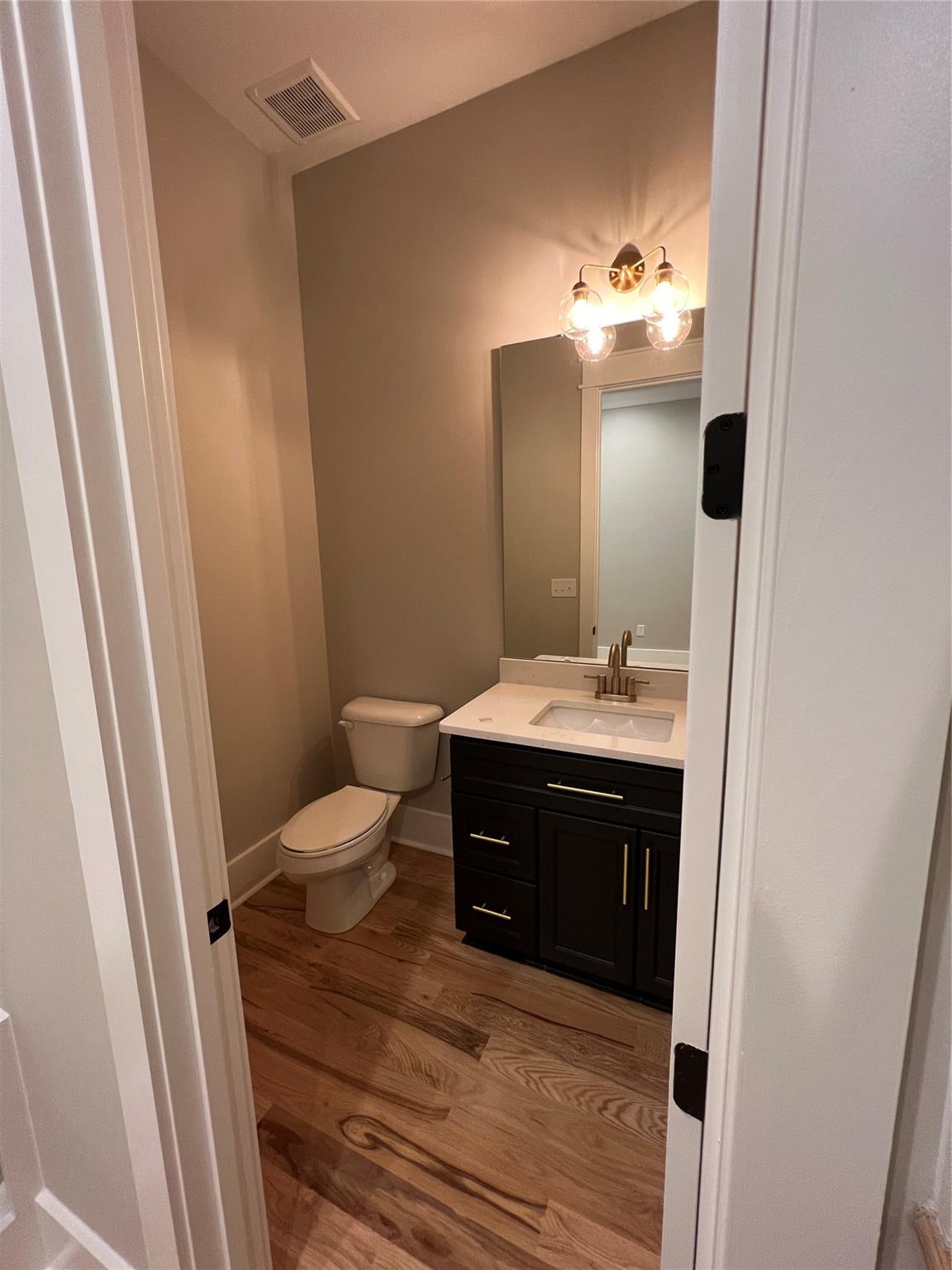 1022 Piney Drive Monroe, NC 28110 - Photo 16 of 48 a bathroom with a sink and a mirror