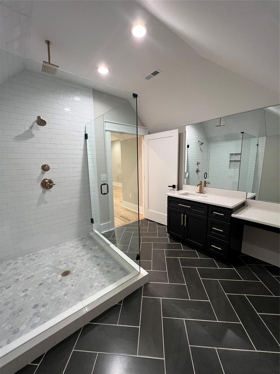 1022 Piney Drive Monroe, NC 28110 - Photo 44 of 48 a bathroom with a double vanity sink mirror and shower