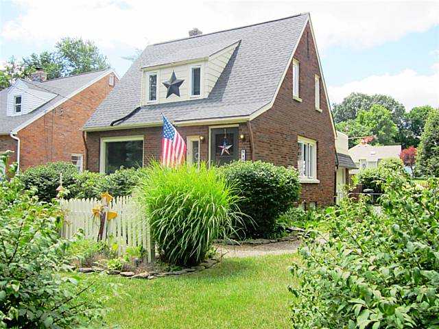943 South Lincoln Road Perinton, NY 14445 - Photo 1 of 1 Exterior Front Delightful Brick Cape Cod with Lush