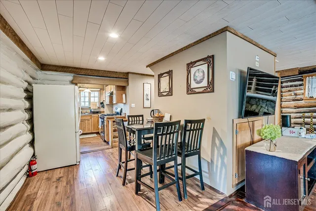 a view of a lake with houses in the back