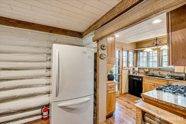 a view of a lake with a building in the background