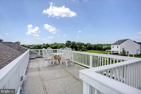 an aerial view of a house with swimming pool yard and outdoor seating