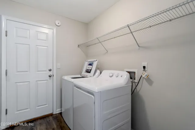 a utility room with dryer and washer