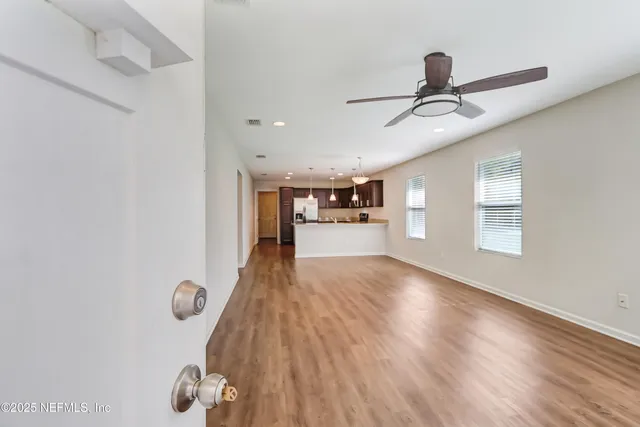 a view of livingroom and hardwood