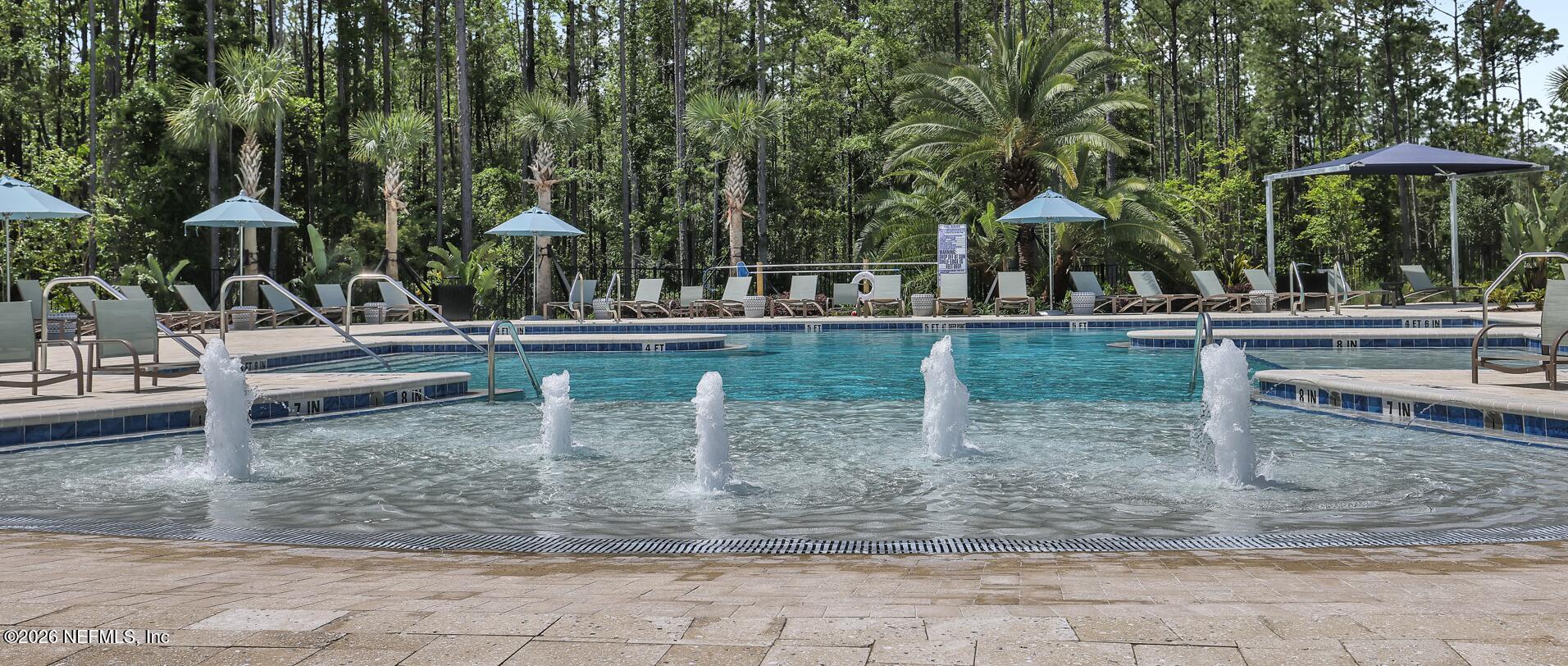 92 Bridgeton Street St. Johns, FL 32259 - Photo 17 of 28 a view of a house with a yard