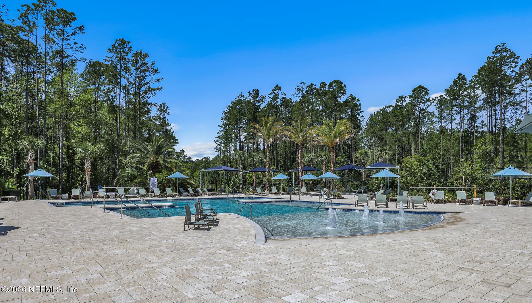 92 Bridgeton Street St. Johns, FL 32259 - Photo 18 of 28 a view of swimming pool with outdoor seating