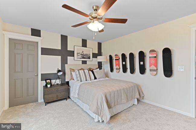 8 Regent Circle Hagerstown, MD 21742 - Photo 13 of 89 a bedroom with a bed and ceiling fan