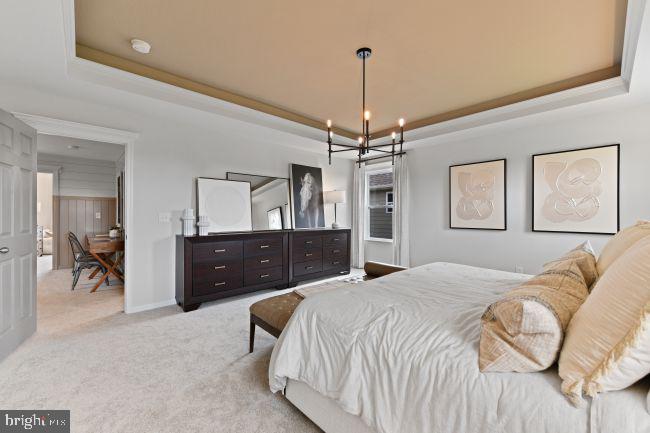 8 Regent Circle Hagerstown, MD 21742 - Photo 16 of 89 a spacious bedroom with a bed and a chandelier