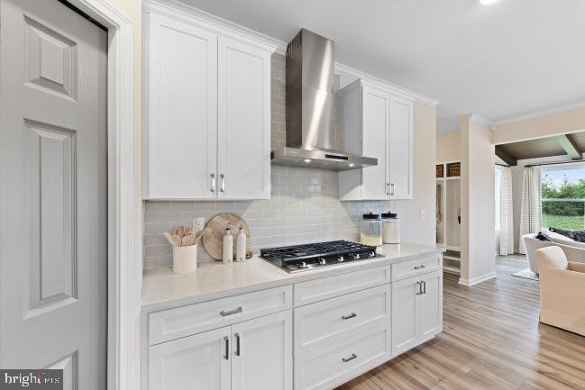 8 Regent Circle Hagerstown, MD 21742 - Photo 3 of 89 a kitchen with white cabinets and wooden floor