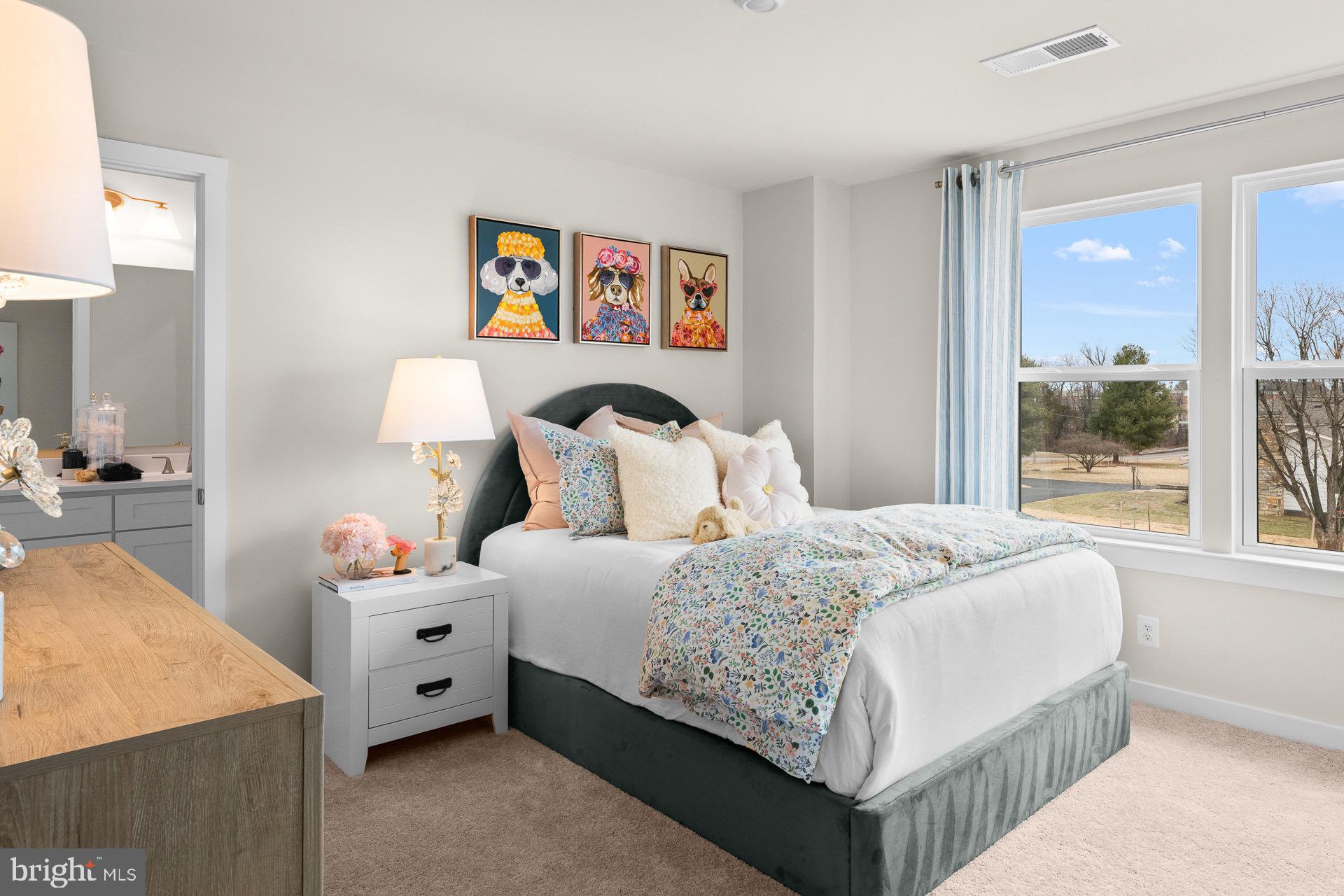 8 Regent Circle Hagerstown, MD 21742 - Photo 45 of 89 a bedroom with a bed and large windows