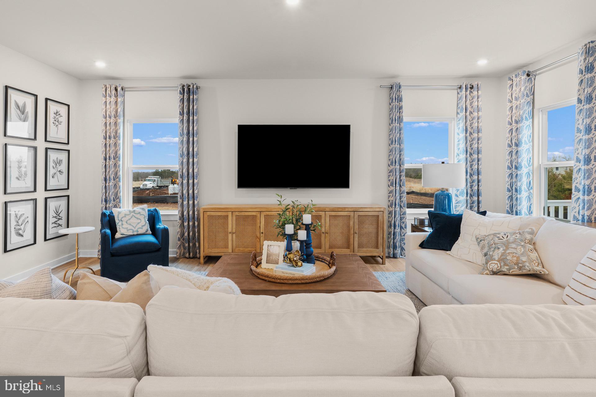 8 Regent Circle Hagerstown, MD 21742 - Photo 83 of 89 a living room with furniture and a flat screen tv