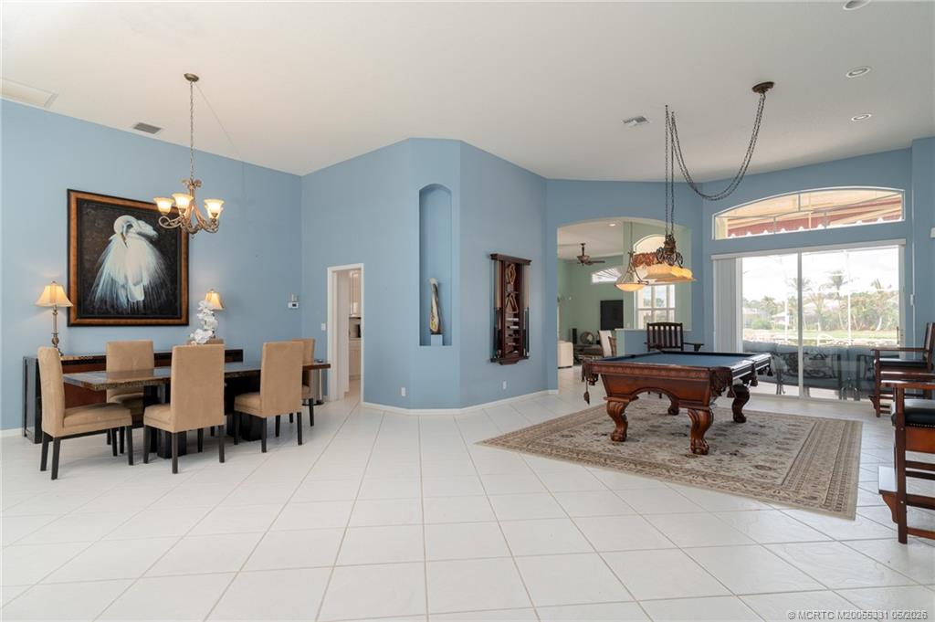 2216 Southeast Stonehaven Road Port St. Lucie, FL 34952 - Photo 10 of 67 a view of a livingroom with furniture window and wooden floor