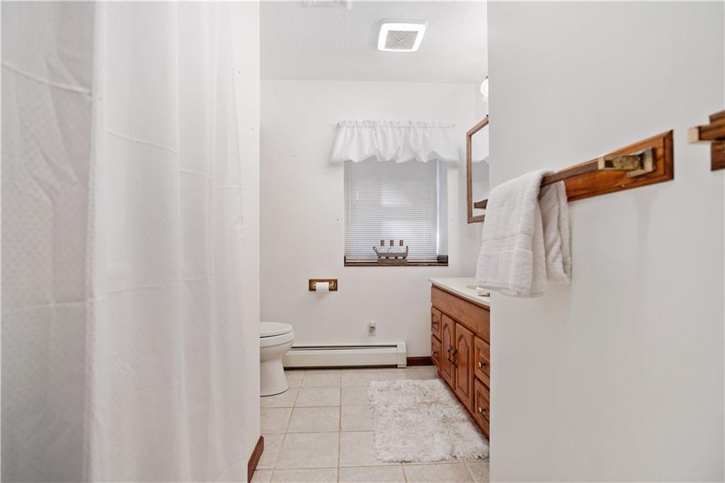525 Georgetown Road Georgetown, PA 15043 - Photo 10 of 25 Main floor full bath for all your guests complete with ceramic flooring.
