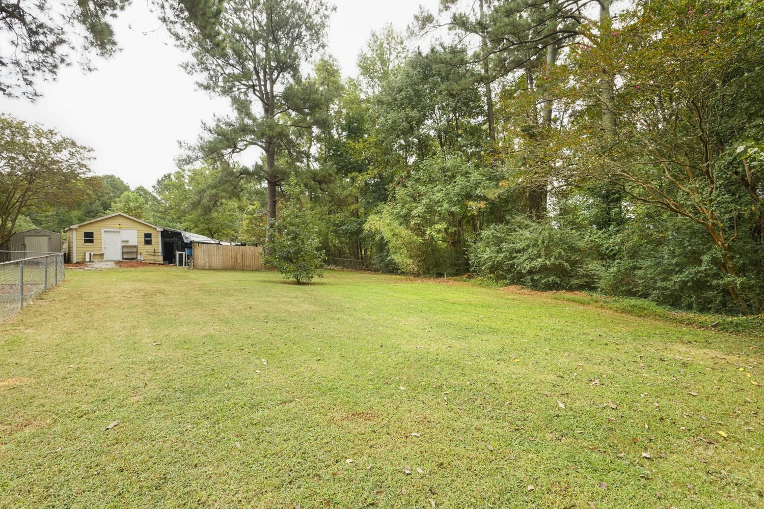 4008 Cheek Road Durham, NC 27704 - Photo 10 of 10 HUGE back yard with WIRED WORKSHOP can also be a HE or SHE SHED! Yard