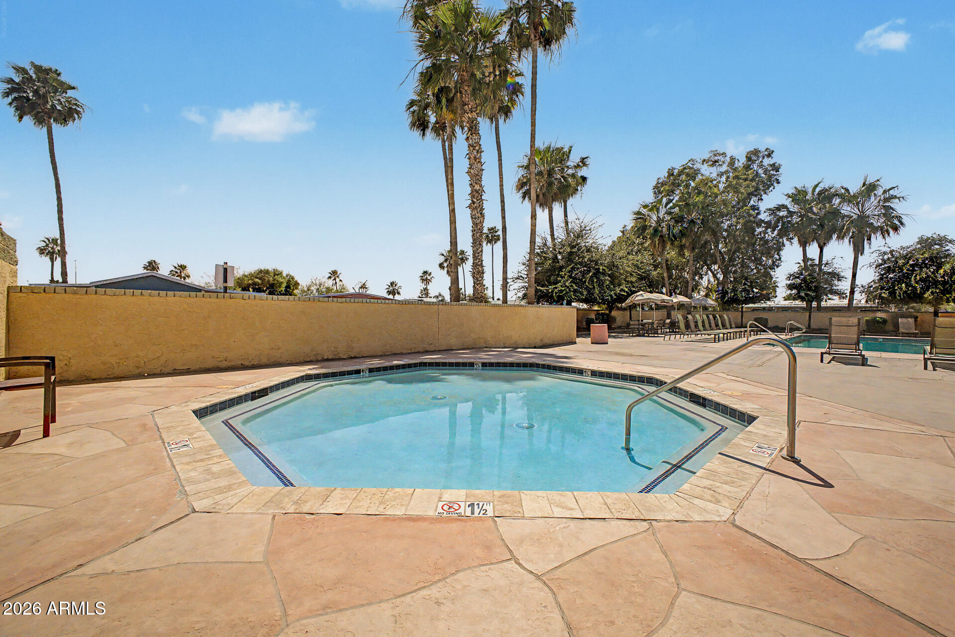 625 West McKellips Road, Unit 55 Mesa, AZ 85201 - Photo 21 of 21 a view of outdoor space and swimming pool