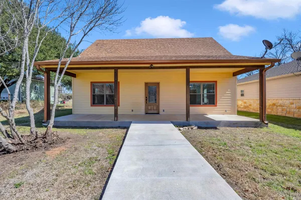 a front view of a house with porch