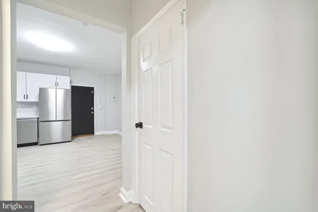 a view of a kitchen with a sink