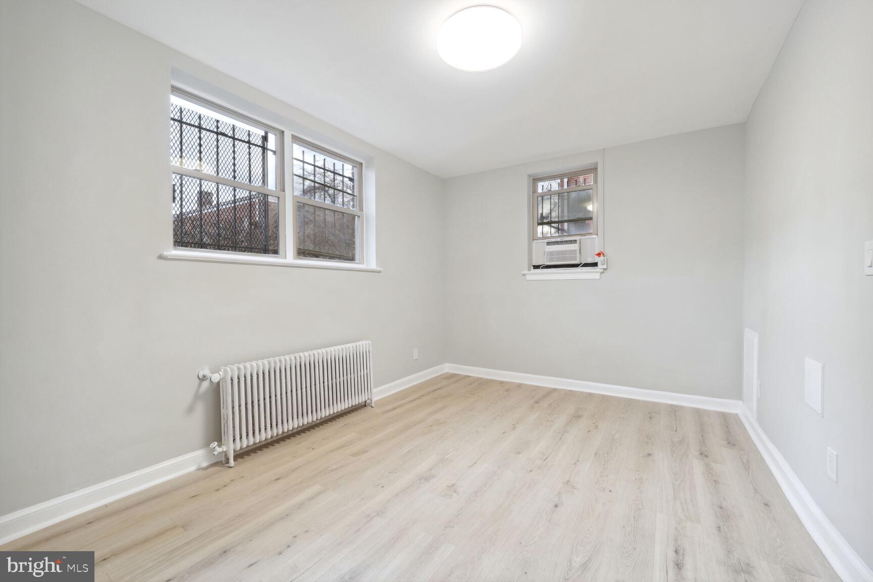 3937 S Street Southeast, Unit 6A Washington, DC 20020 - Photo 8 of 23 a view of an empty room with a window