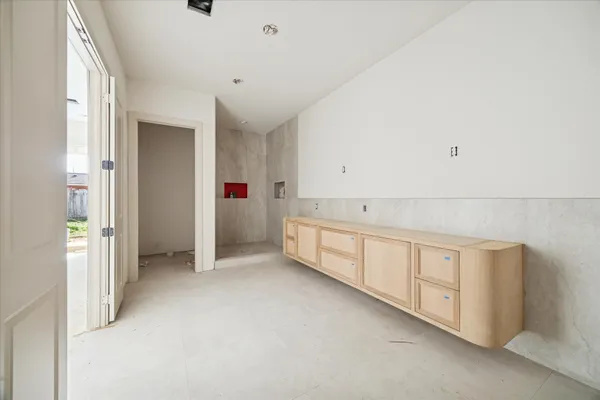 a view of an empty room with closet