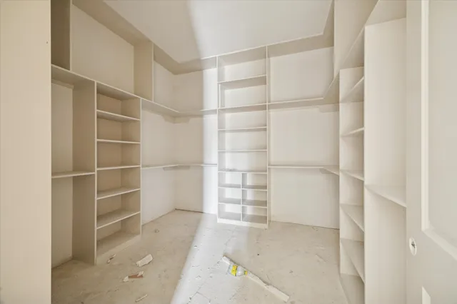 a view of an empty walk in closet