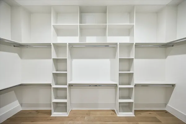 a view of an empty walk in closet