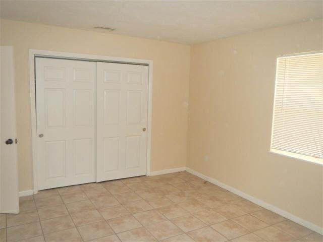 909 Southeast Nassau Avenue Stuart, FL 34994 - Photo 6 of 11 Bedroom