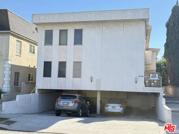 a car parked in front of a building