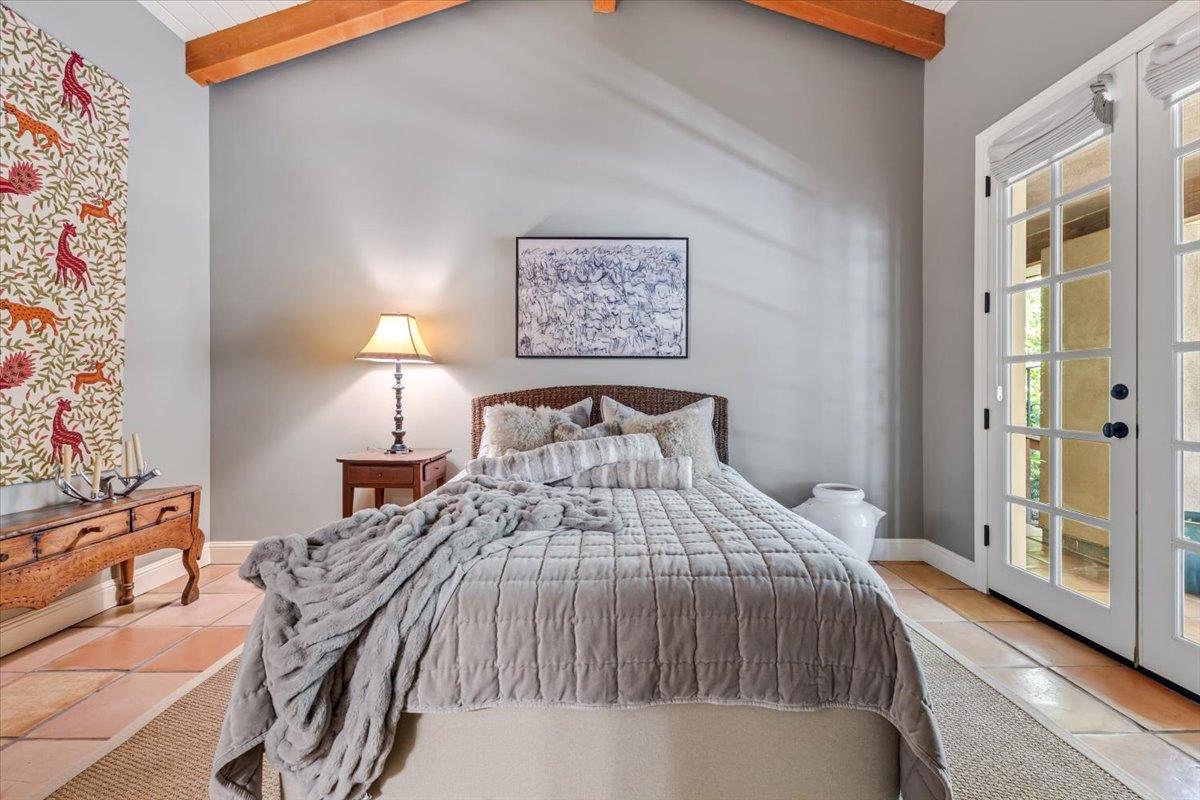 2727 Thomas Road Hollister, CA 95023 - Photo 57 of 83 a bedroom with a bed and a lamp on dresser
