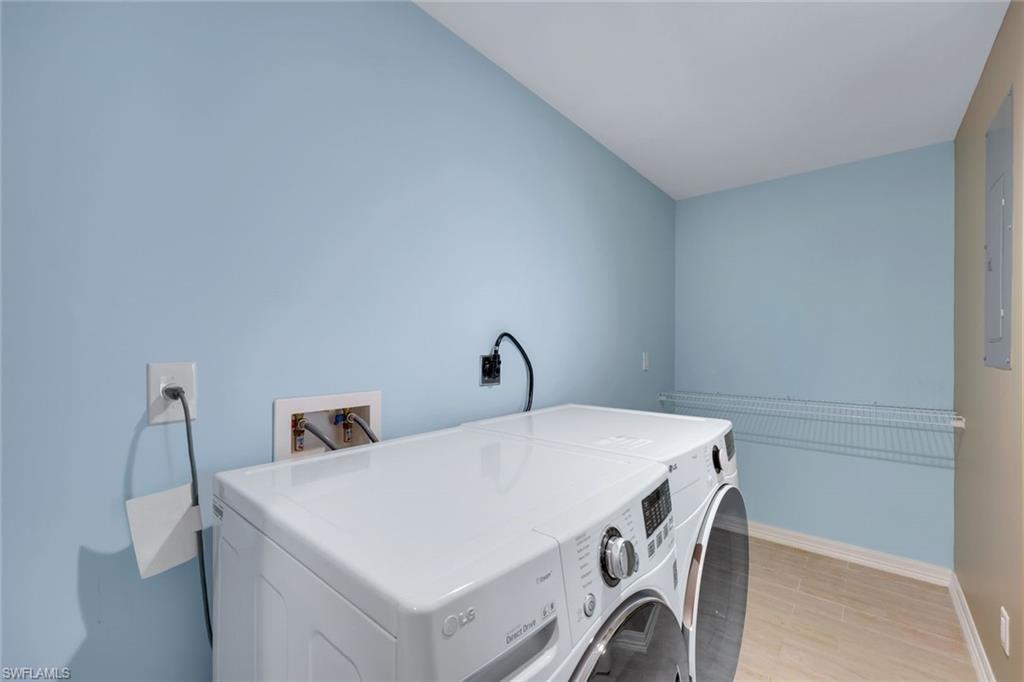 5175 Green Boulevard Naples, FL 34116 - Photo 24 of 43 a utility room with dryer and washer