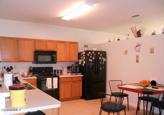 340 Trier Road Northwest Palm Bay, FL 32907 - Photo 7 of 17 TRIER KITCHEN II