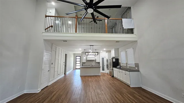 a view of a kitchen from the hallway