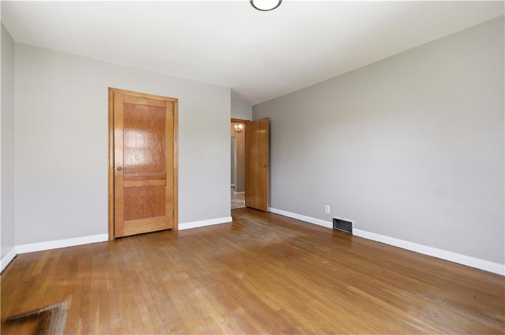 64 Harmon Creek Road Burgettstown, PA 15021 - Photo 15 of 29 an empty room with wooden floor and closet