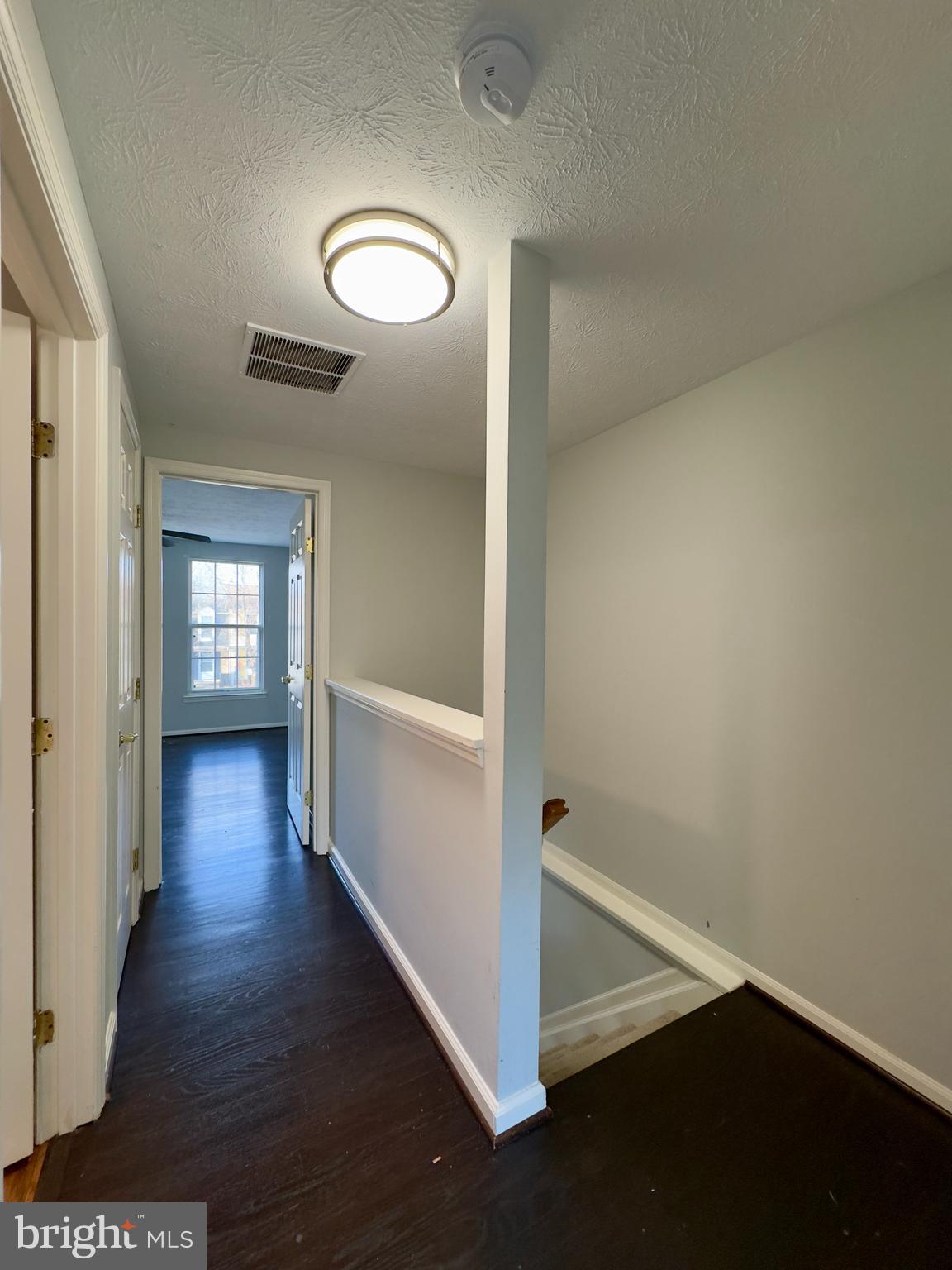 2209 Riding Crop Way Baltimore, MD 21244 - Photo 20 of 20 a view of an entryway with wooden floor