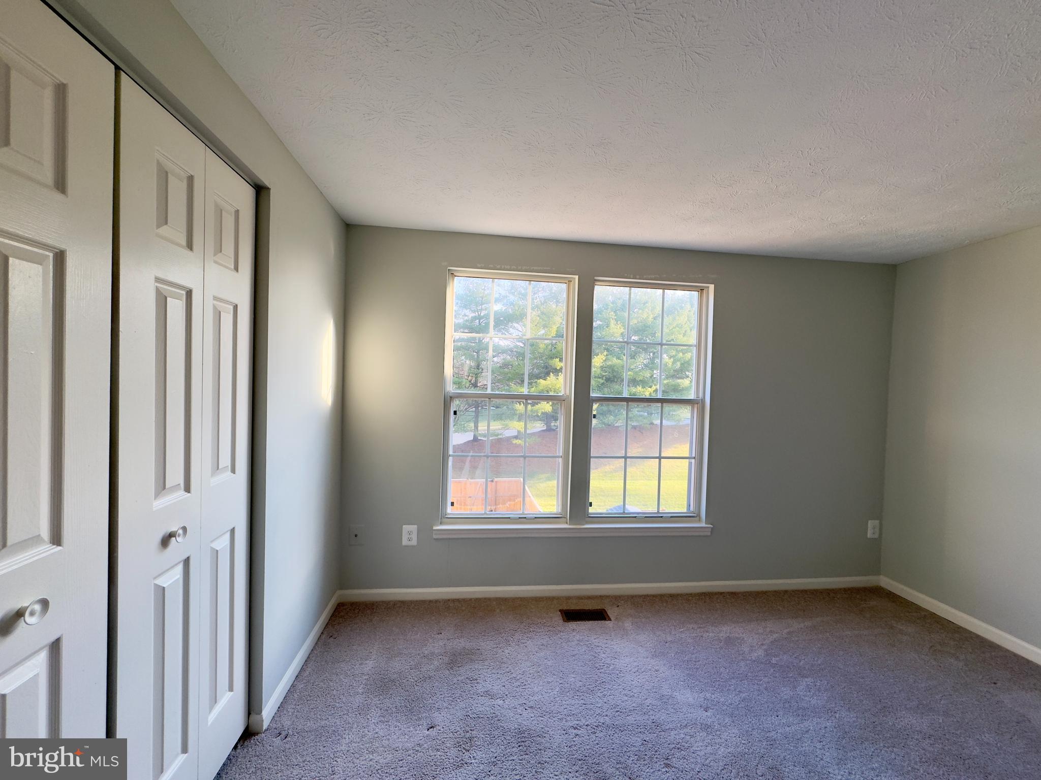 2209 Riding Crop Way Baltimore, MD 21244 - Photo 2 of 20 a view of an empty room with a window