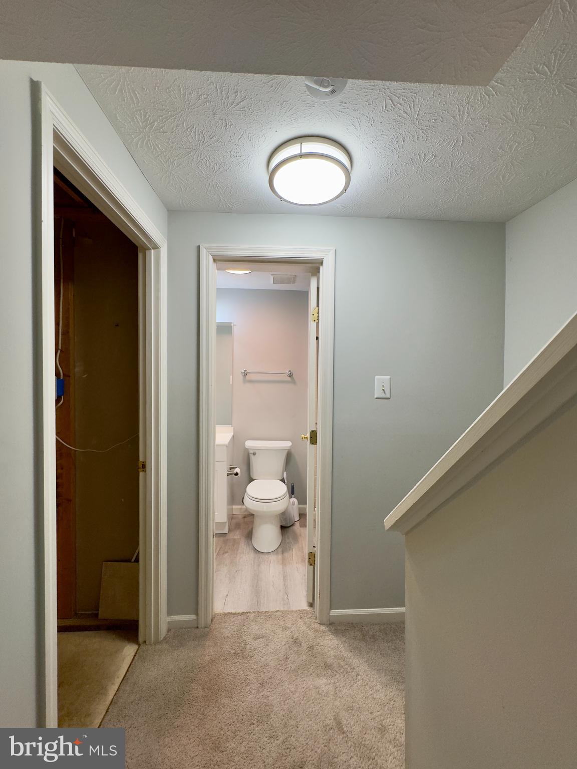 2209 Riding Crop Way Baltimore, MD 21244 - Photo 7 of 20 a view of a bathroom with a sink and a toilet