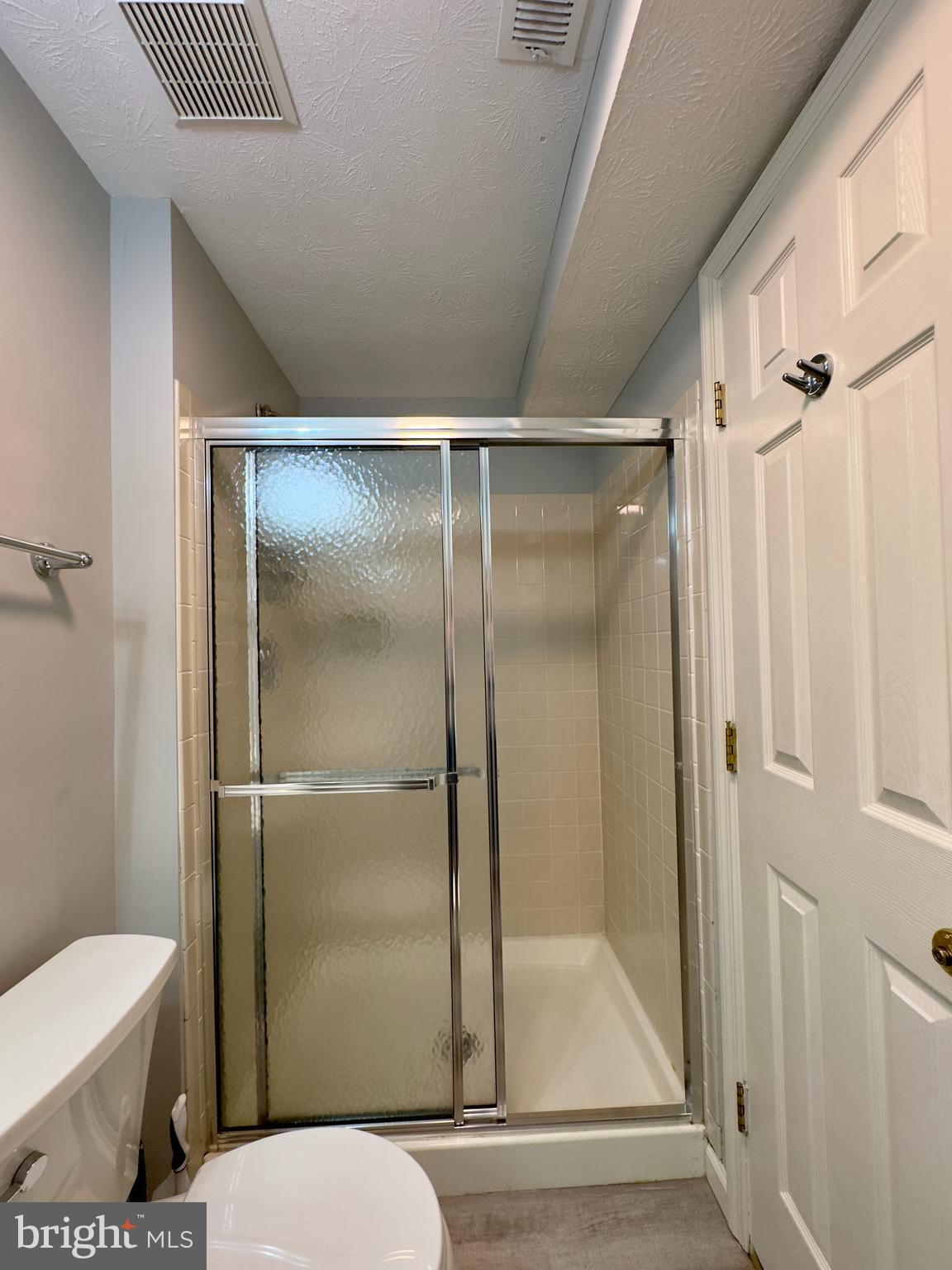 2209 Riding Crop Way Baltimore, MD 21244 - Photo 9 of 20 a bathroom with a toilet and a shower