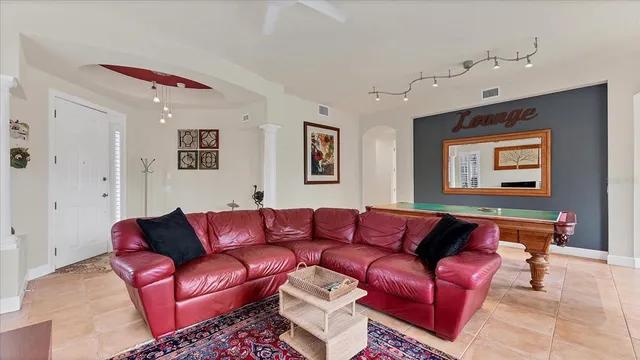 a living room with furniture or couch and a window