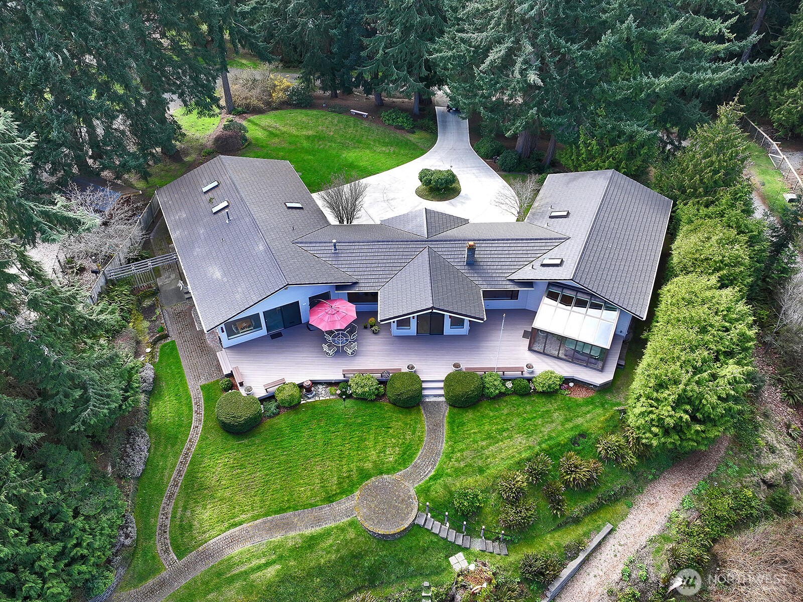 8111 Possession Ridge Lane Clinton, WA 98236 - Photo 11 of 37 an aerial view of a house with backyard space and garden
