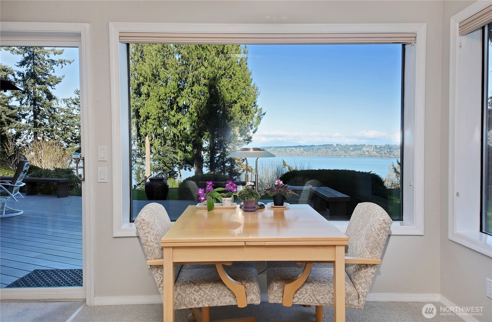 8111 Possession Ridge Lane Clinton, WA 98236 - Photo 24 of 37 a view of a dining room with furniture and window