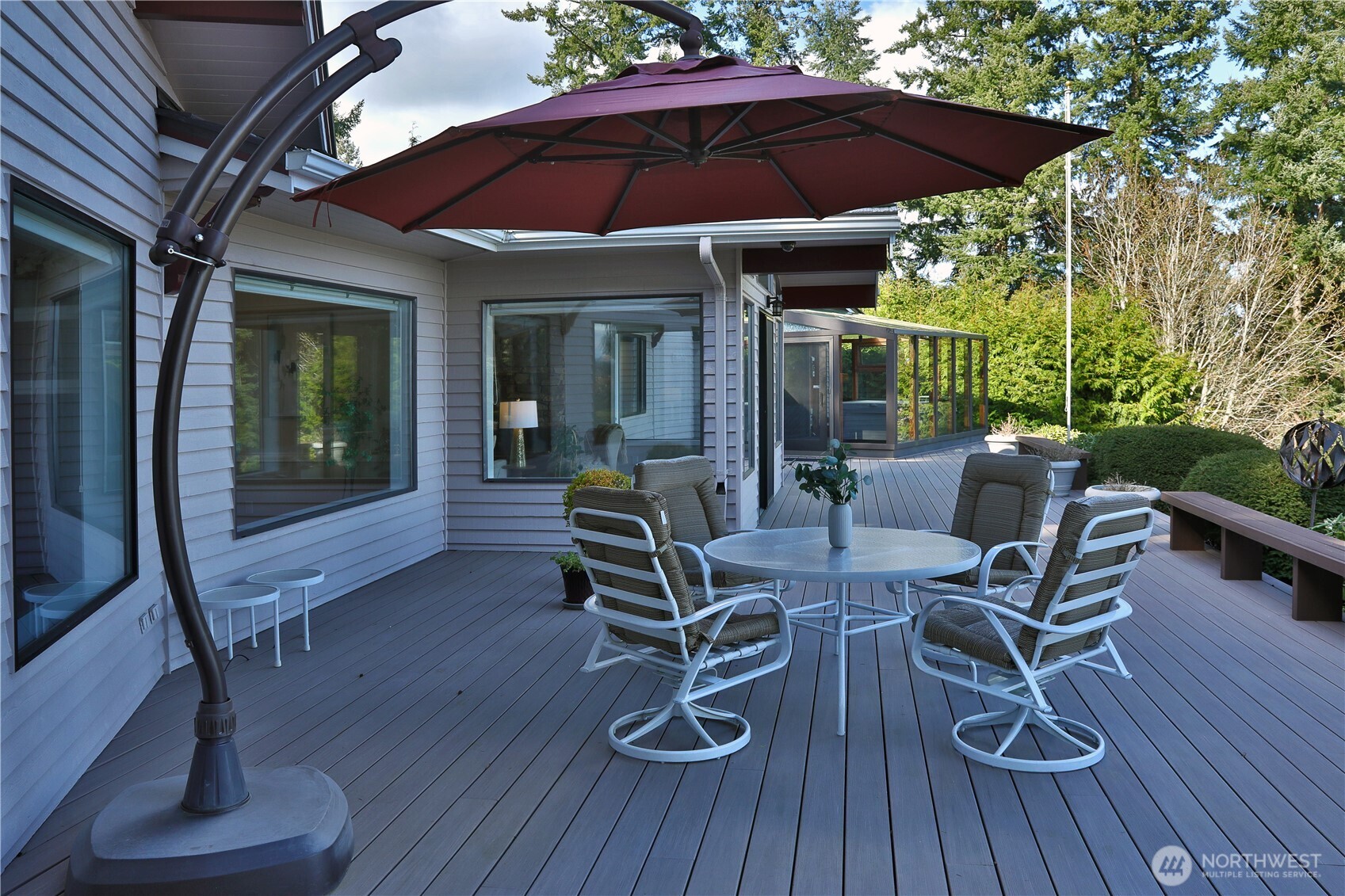 8111 Possession Ridge Lane Clinton, WA 98236 - Photo 9 of 37 a patio with table and chairs