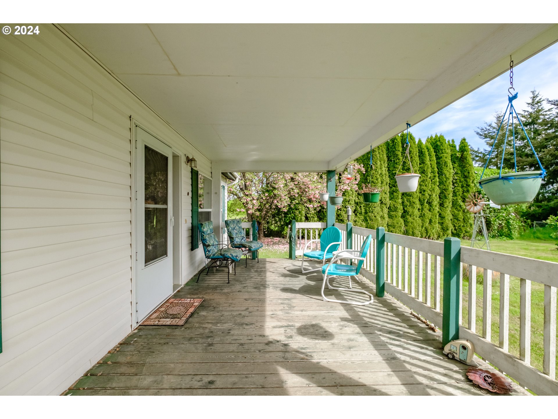8560 Southeast Wallace Road Dayton, OR 97114 - Photo 14 of 48 a building outdoor space with patio furniture and garden view